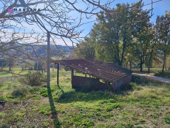 Farmhouse with land