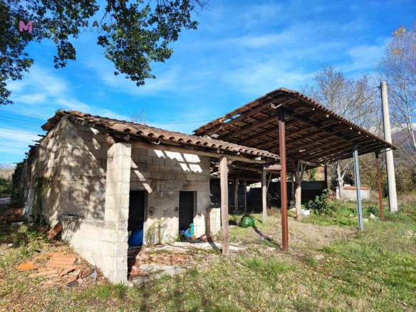 Farmhouse with land