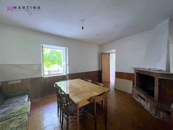 Semi-detached house with land