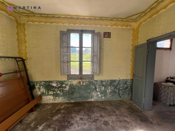 Semi-detached house with land