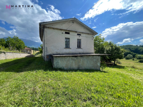 Semi-detached house with land