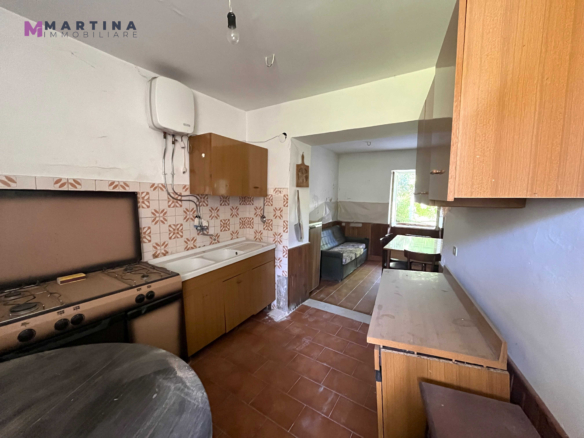 Semi-detached house with land