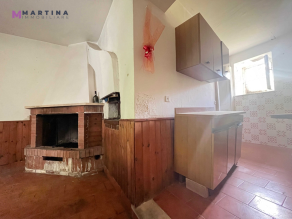 Semi-detached house with land