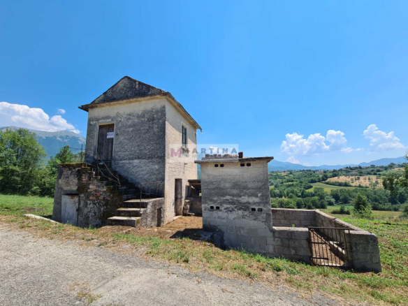 Farmhouse with land