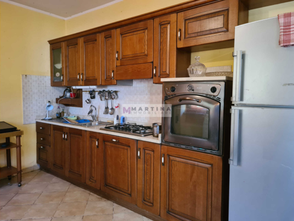 Complesso Immobiliare con Abitazioni, Fabbricati Rurali e Terreno