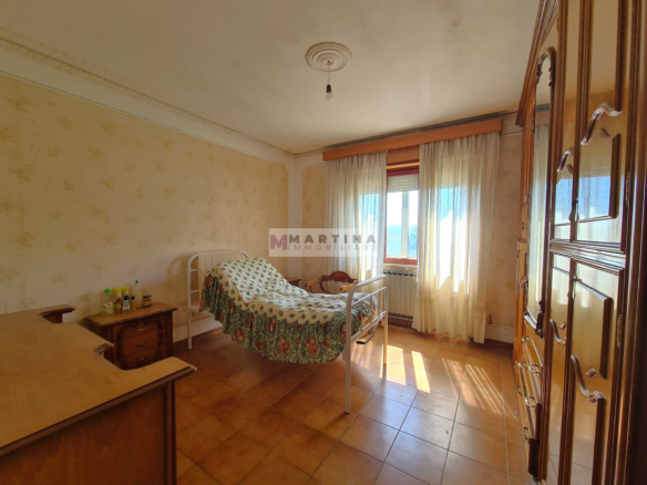 Complesso Immobiliare con Abitazioni, Fabbricati Rurali e Terreno