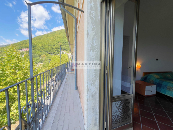Doppio appartamento con terrazzo e giardino privato