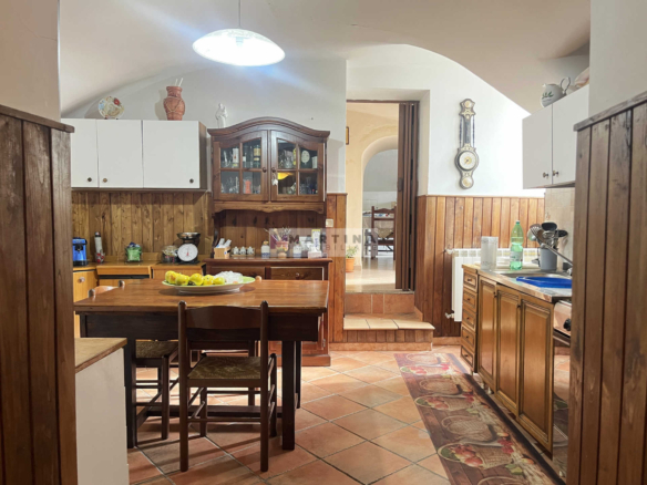 Ancient farmhouse surrounded by greenery