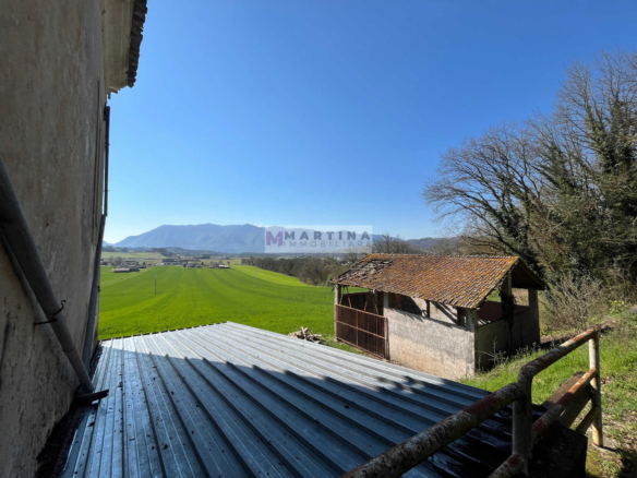 Portion of an old farmhouse with land