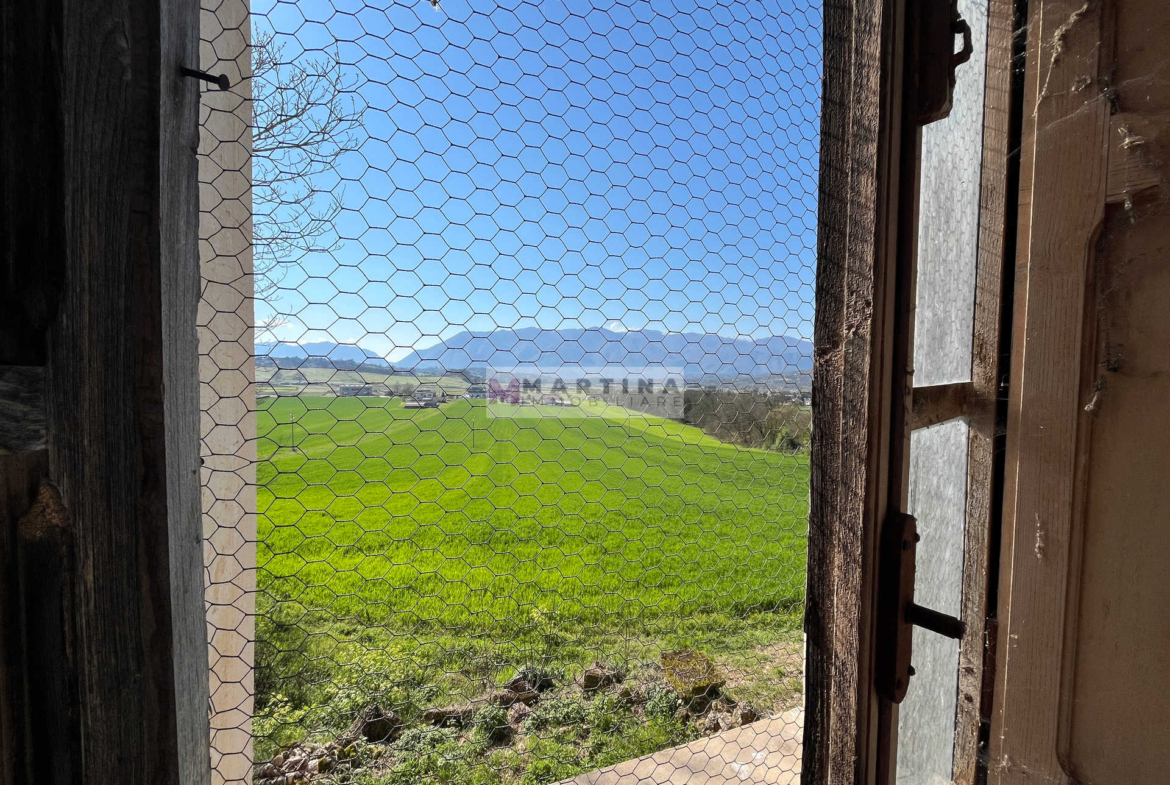 Porzione di antico casale con terreno