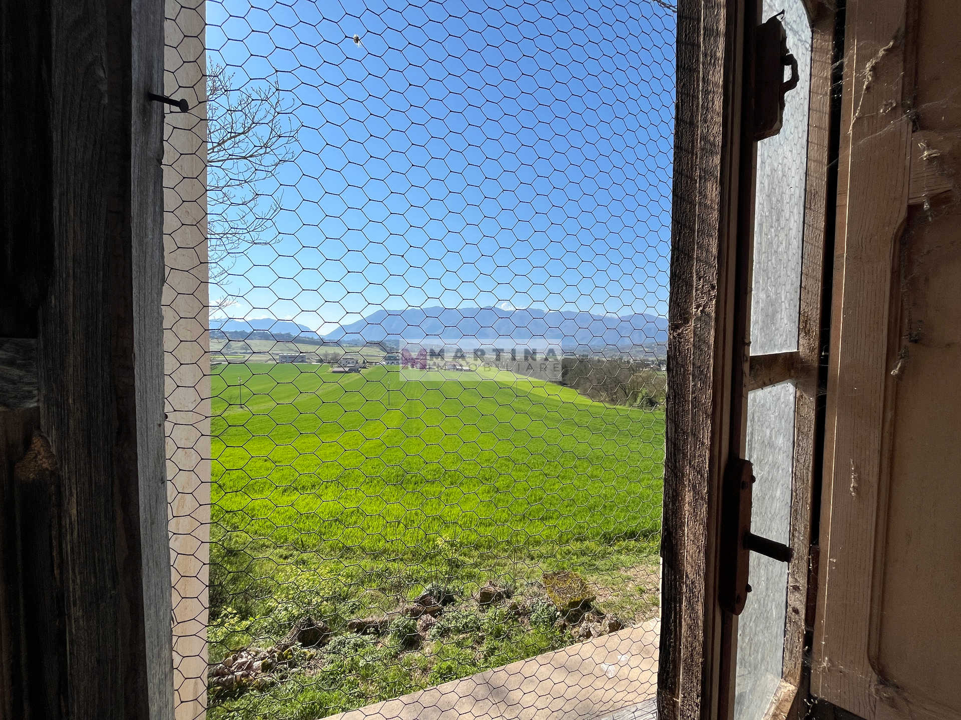 Porzione di antico casale con terreno