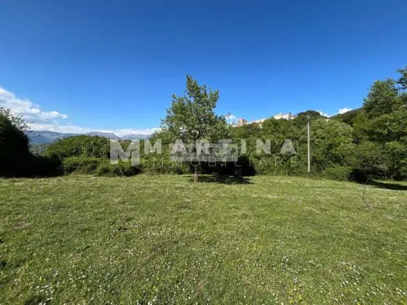 Property with reinforced concrete structure, buildings and land