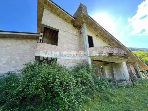 Property with reinforced concrete structure, buildings and land