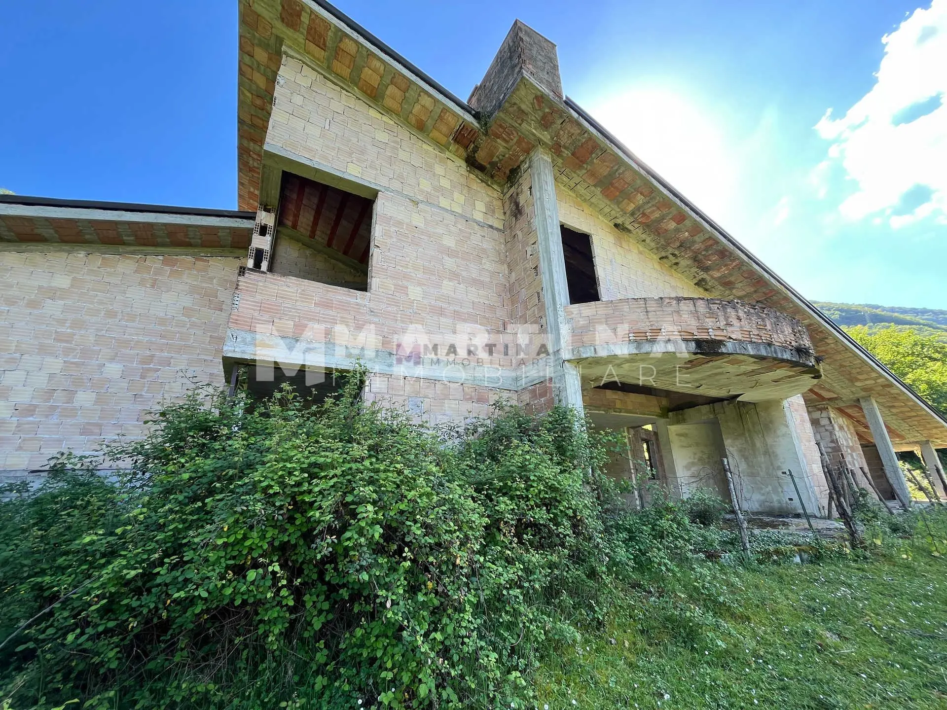 Property with reinforced concrete structure, buildings and land