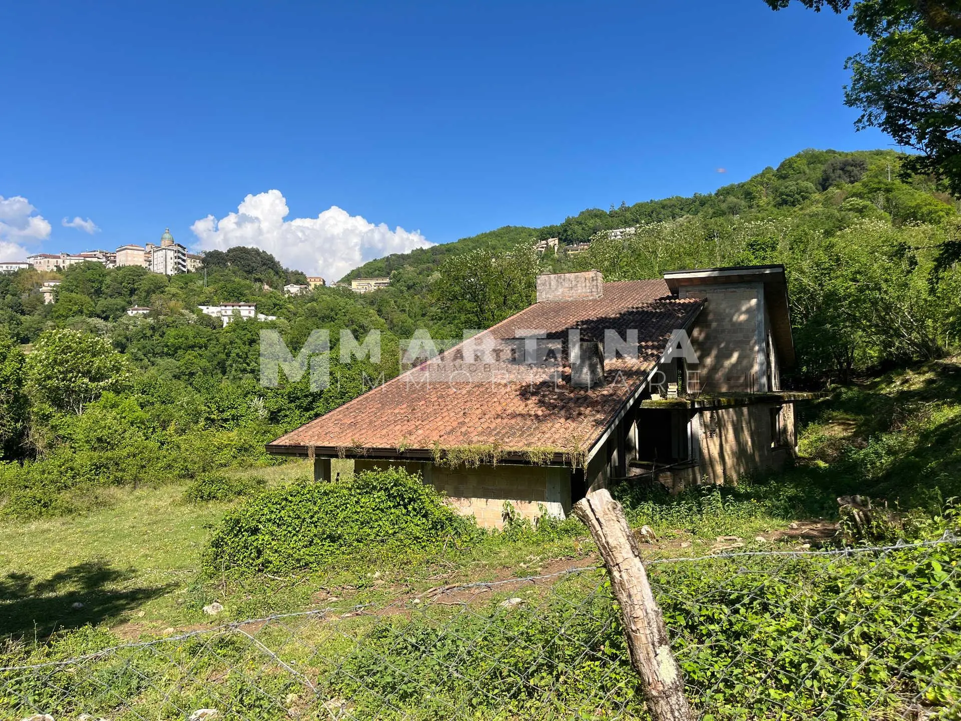 Property with reinforced concrete structure, buildings and land