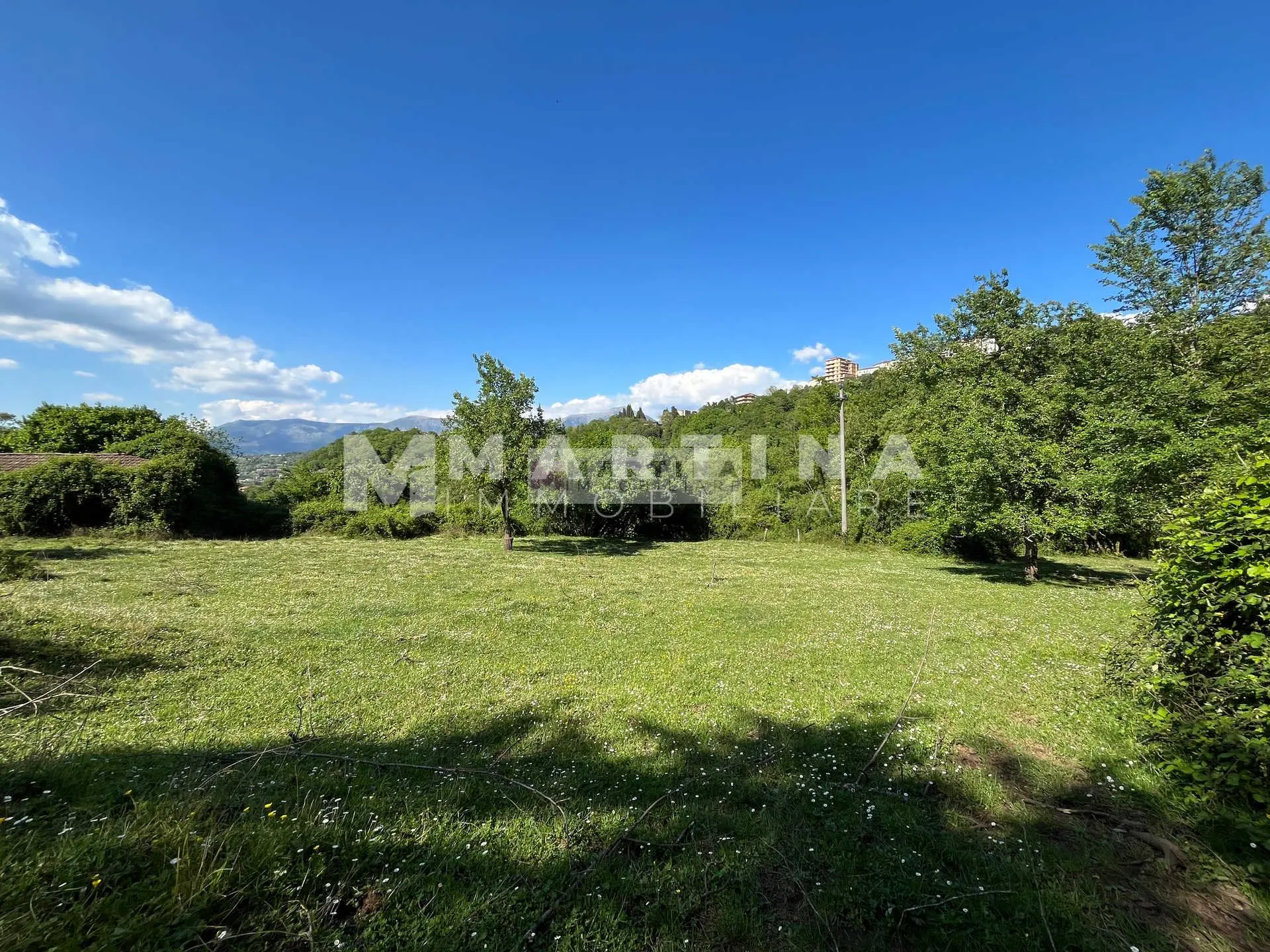 Property with reinforced concrete structure, buildings and land