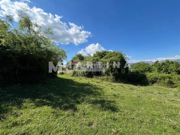 Property with reinforced concrete structure, buildings and land