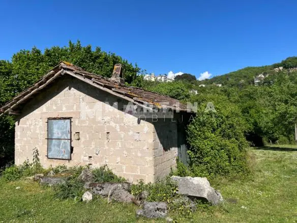 Property with reinforced concrete structure, buildings and land