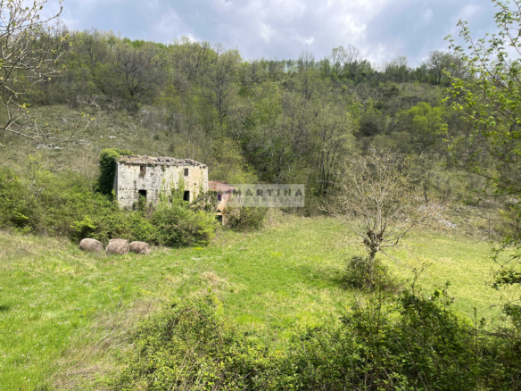 Land with portion of building
