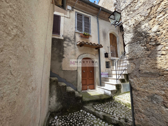 Terraced house with double entrance