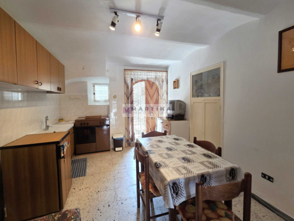 Terraced house with double entrance