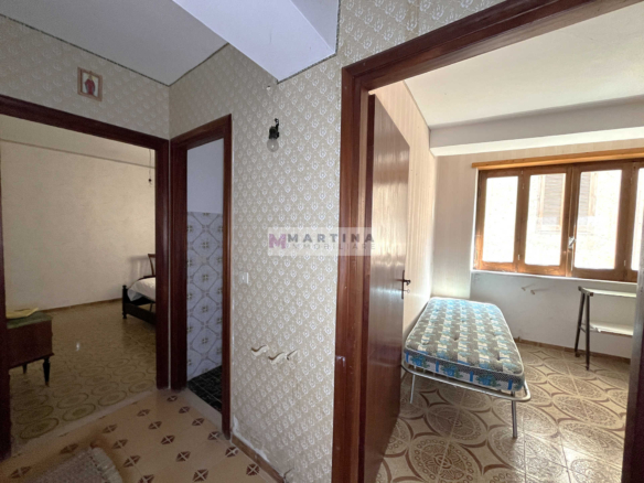 Terraced house with 3 apartments, terrace and garage