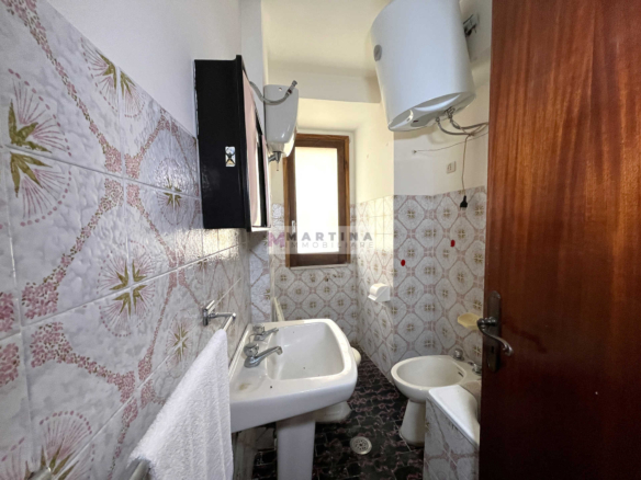 Terraced house with 3 apartments, terrace and garage