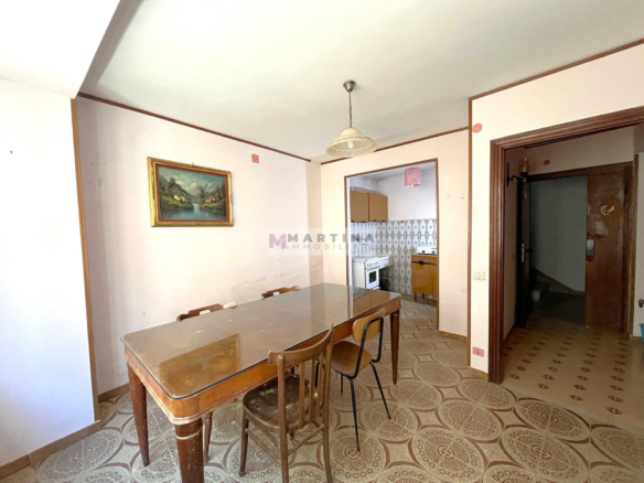 Terraced house with 3 apartments, terrace and garage