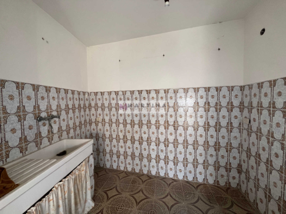 Terraced house with 3 apartments, terrace and garage