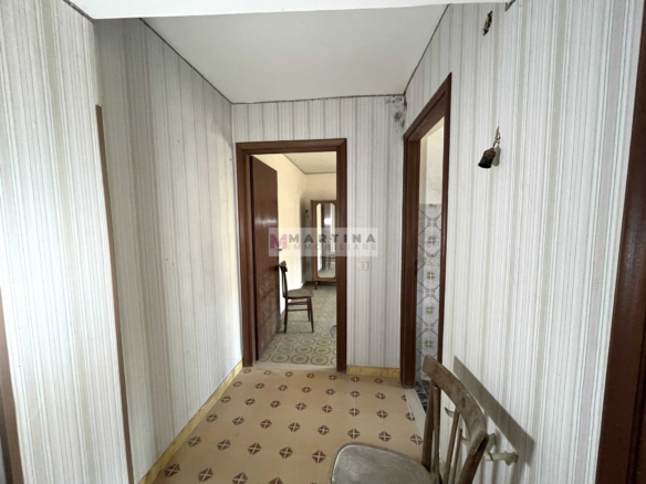 Terraced house with 3 apartments, terrace and garage