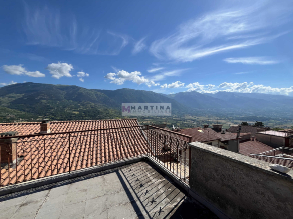 Terraced house with 3 apartments, terrace and garage