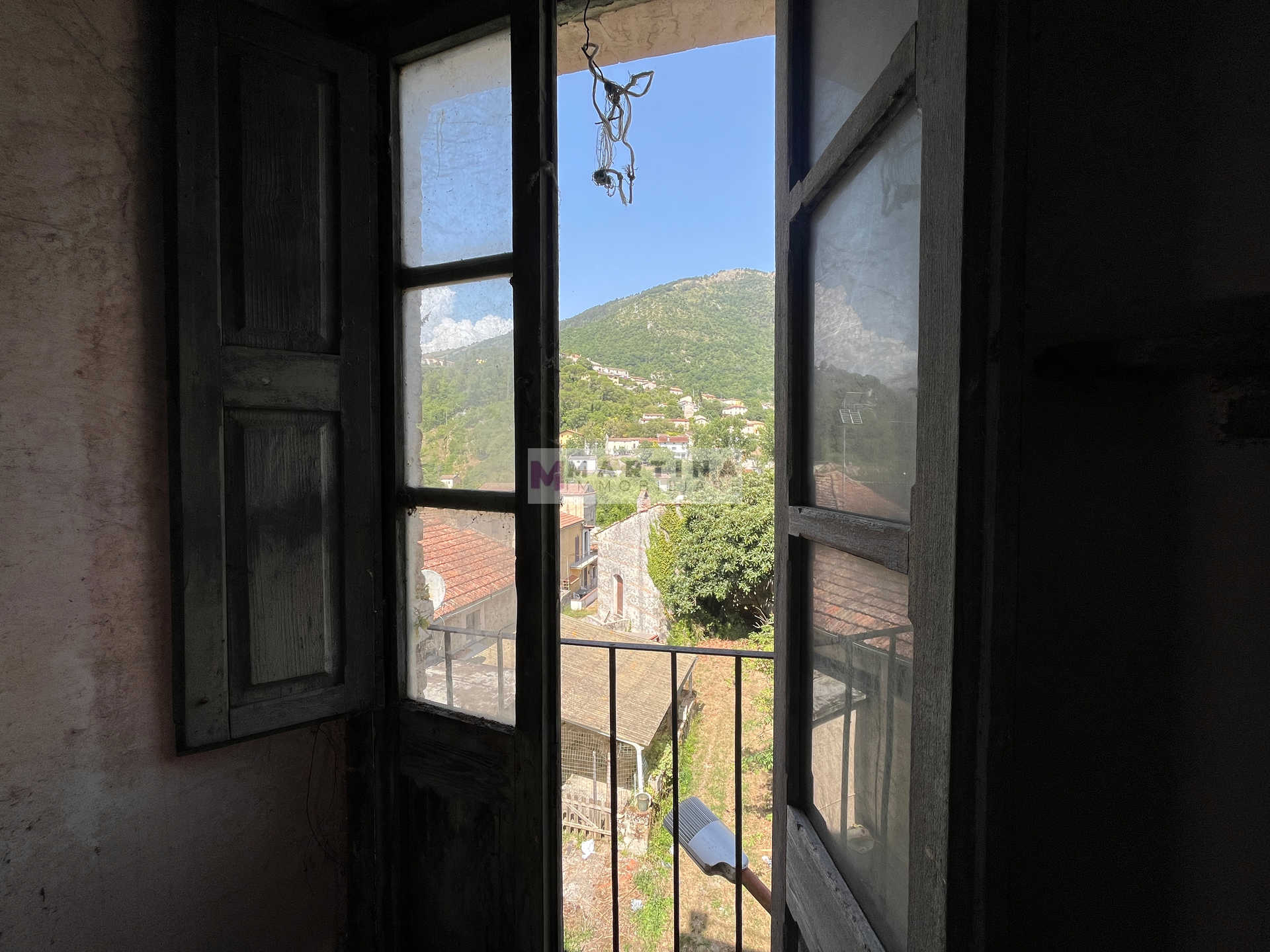 Terracielo da ristrutturare con terrazza panoramica