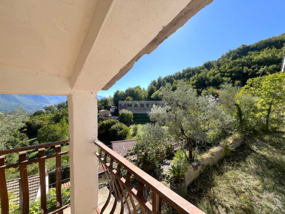 Detached house with land