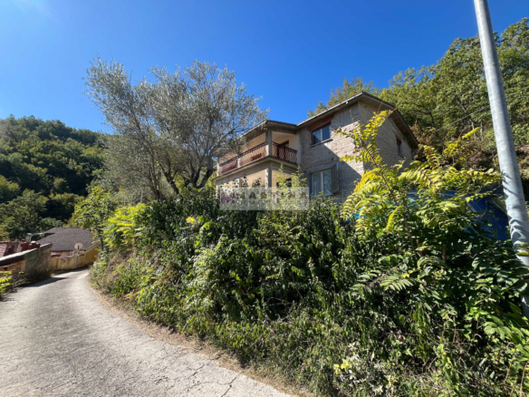 Detached house with land