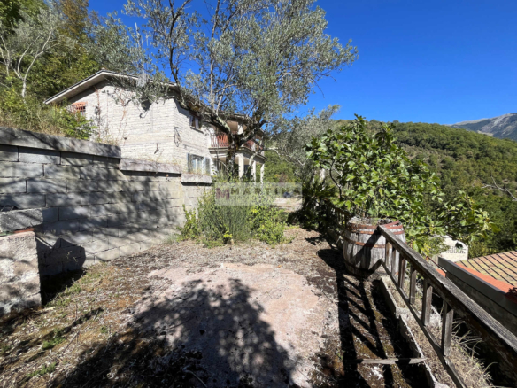 Detached house with land
