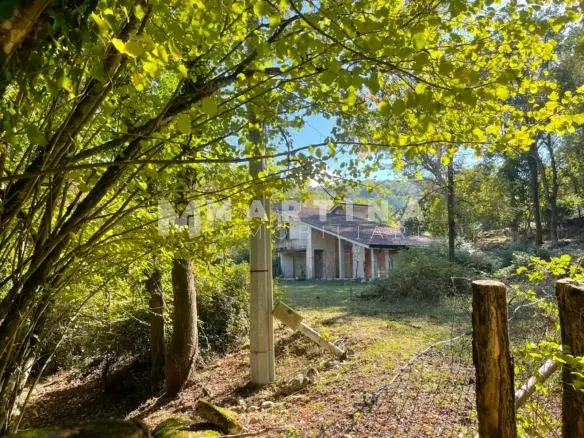 Property with reinforced concrete structure, buildings and land