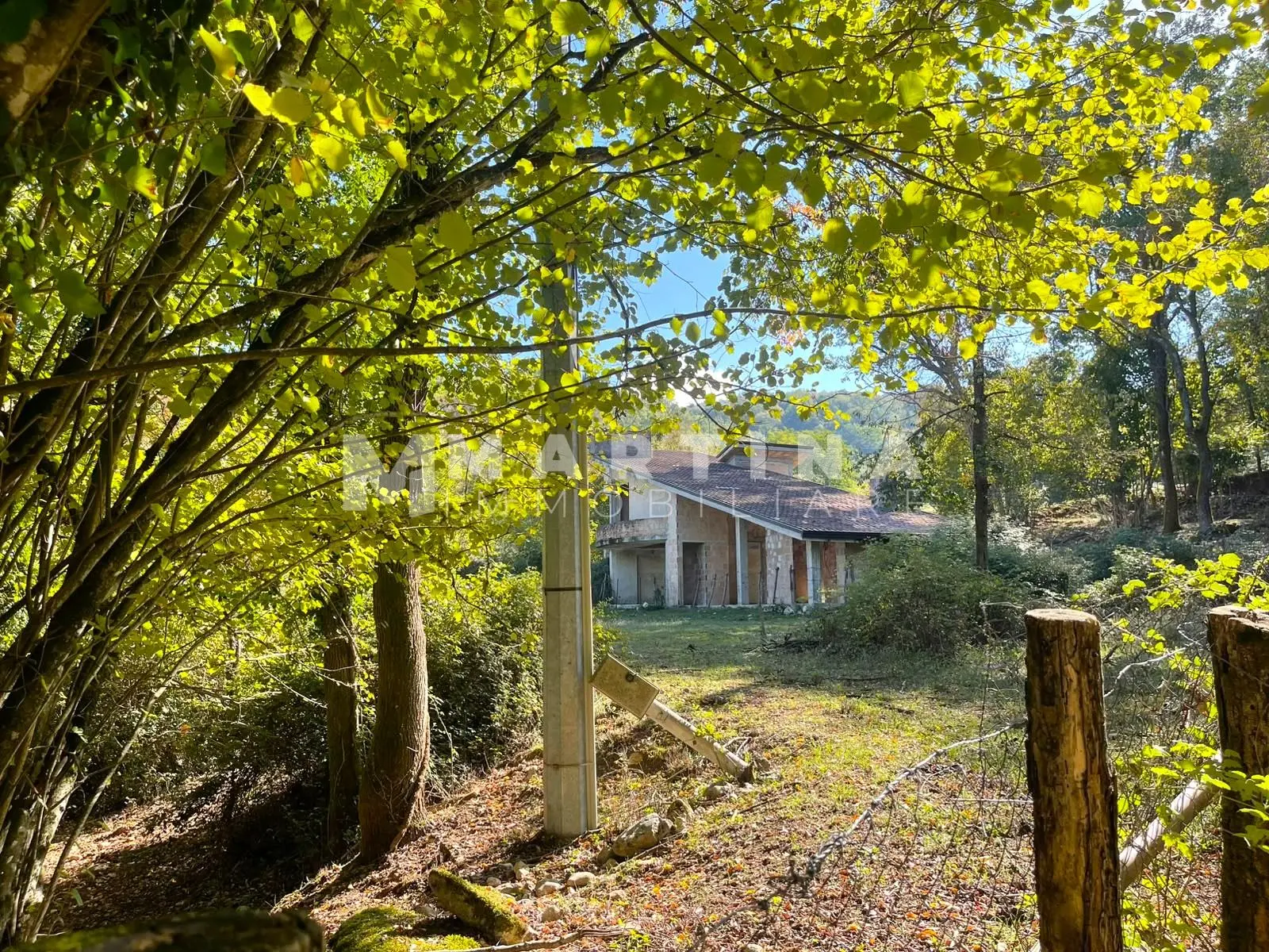 Property with reinforced concrete structure, buildings and land