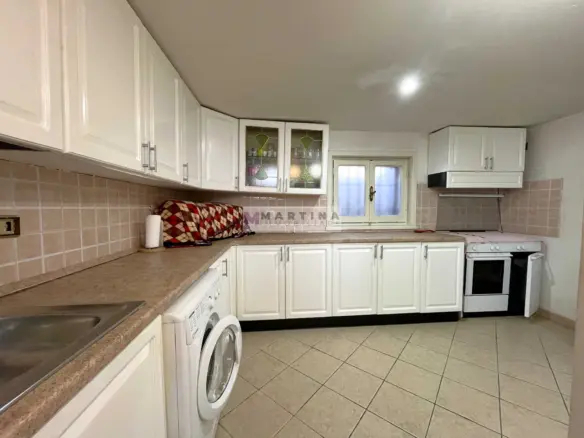 Detached house with garage and land